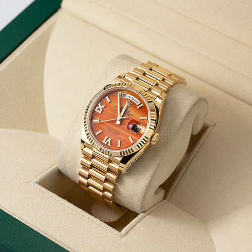 Rolex Day-Date 36, Orange Carnelian Roman Diamond Dial, 18K Yellow Gold