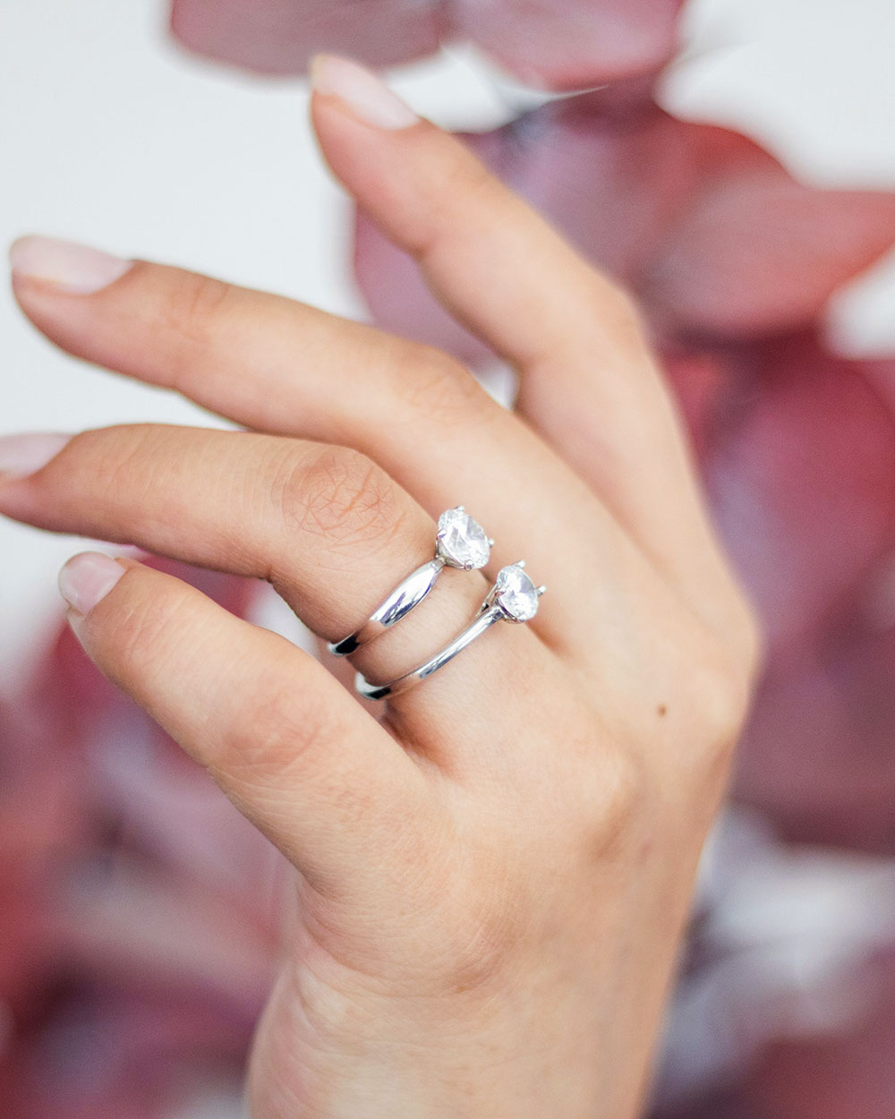 Borrowing against diamond jewelry - woman wearing two diamond rings