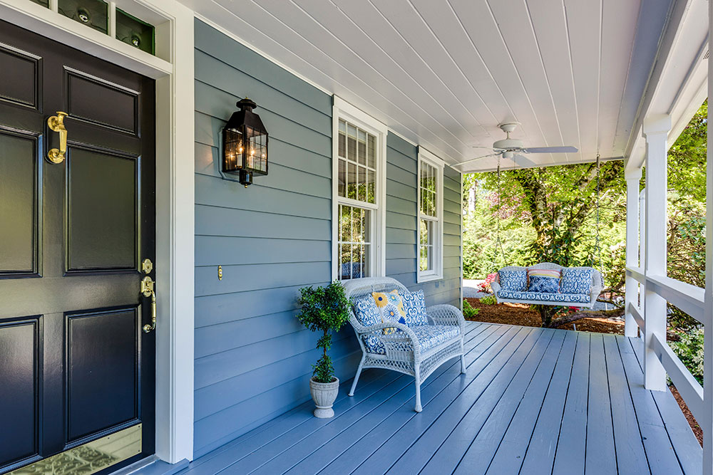 Financing a new business using SBA loans - a blue house with a front porch