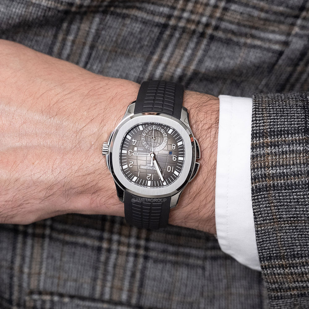 Patek Philippe Aquanaut, Travel Time, Stainless Steel, Black Arabic Dial, 40 mm